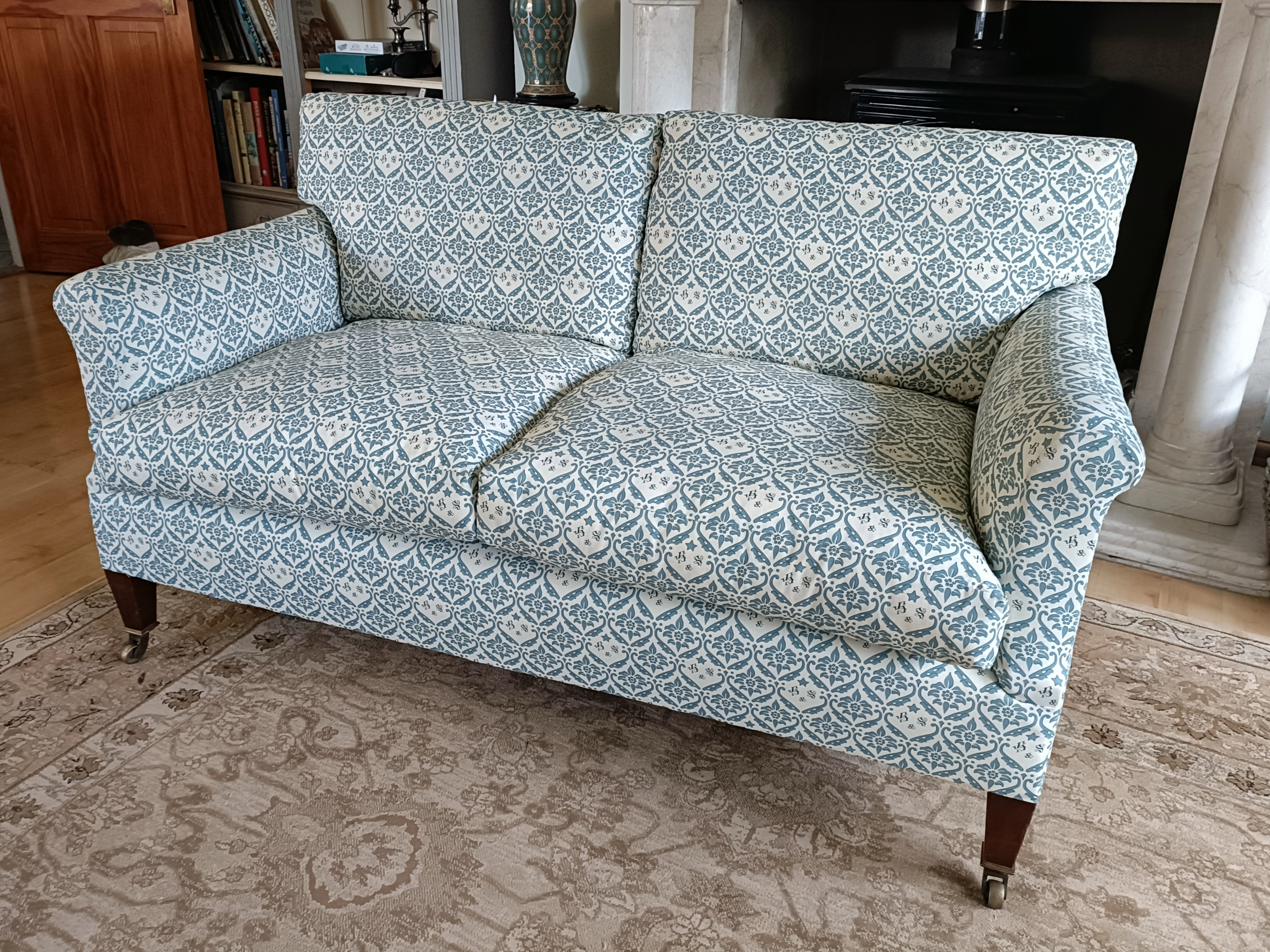 Library armchair with swept arms for sale UK